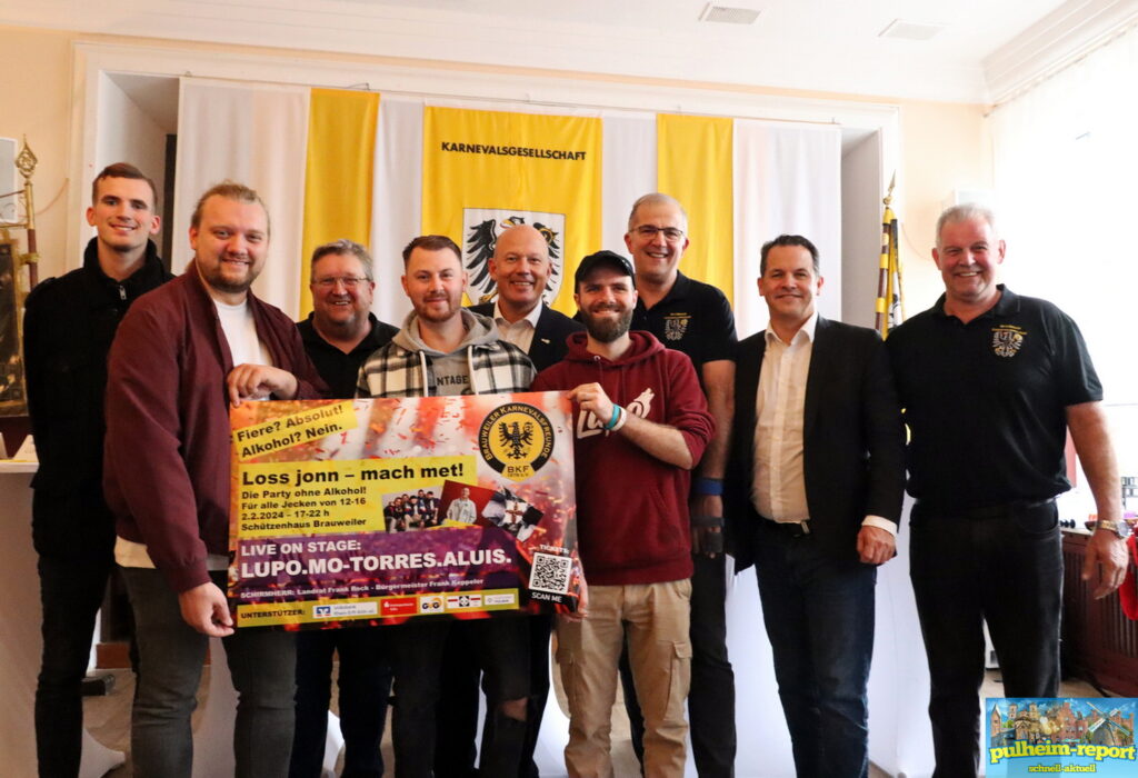 Der Vorstand der Brauweiler Karnevalsfreunde, Landrat Frank Rock, Bürgermeister Frank Keppeler, die Bandmitglieder von Lupo und Aluis und Marco Ages freuen sich gemeinsam auf die Jugendparty.